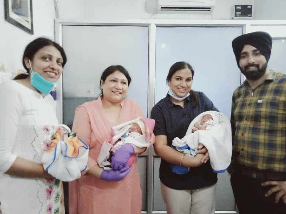 Happy family with triplets delivered at Aashirwad Hospital